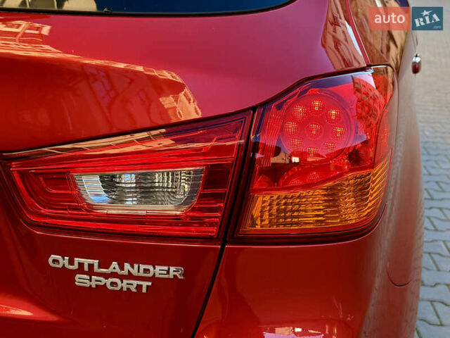 Красный Мицубиси Outlander Sport, объемом двигателя 2 л и пробегом 99 тыс. км за 11999 $, фото 28 на Automoto.ua