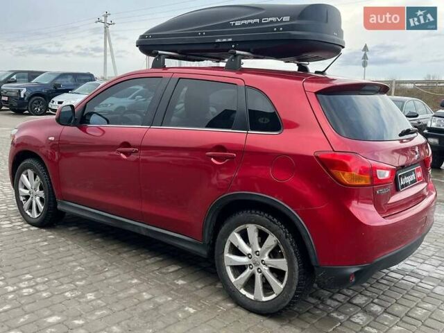 Красный Мицубиси Outlander Sport, объемом двигателя 2 л и пробегом 220 тыс. км за 10500 $, фото 17 на Automoto.ua