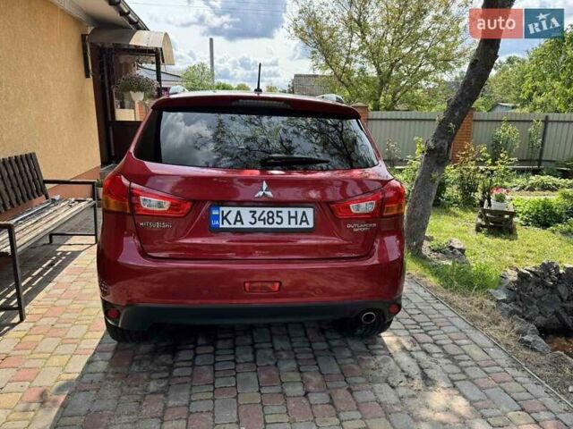 Красный Мицубиси Outlander Sport, объемом двигателя 2 л и пробегом 172 тыс. км за 12500 $, фото 3 на Automoto.ua