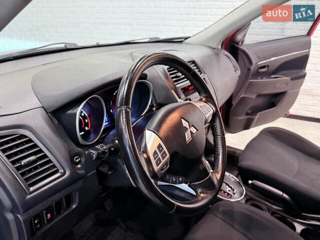 Красный Мицубиси Outlander Sport, объемом двигателя 2 л и пробегом 99 тыс. км за 11999 $, фото 34 на Automoto.ua