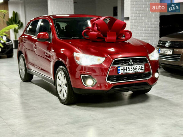 Красный Мицубиси Outlander Sport, объемом двигателя 2 л и пробегом 99 тыс. км за 11999 $, фото 18 на Automoto.ua