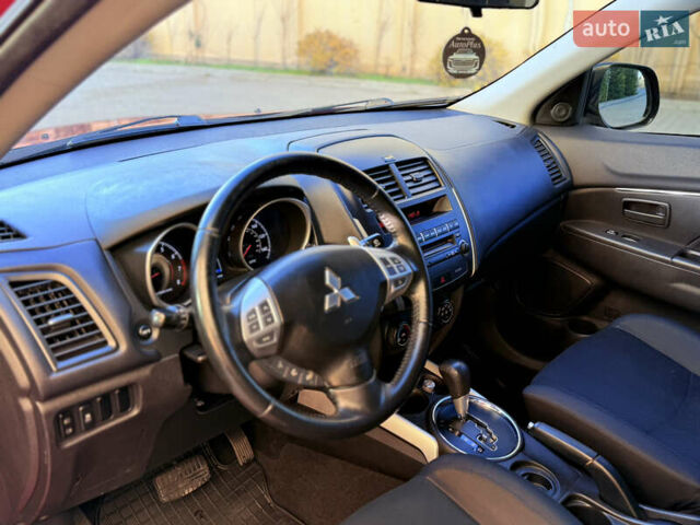 Красный Мицубиси Outlander Sport, объемом двигателя 2 л и пробегом 99 тыс. км за 11999 $, фото 38 на Automoto.ua
