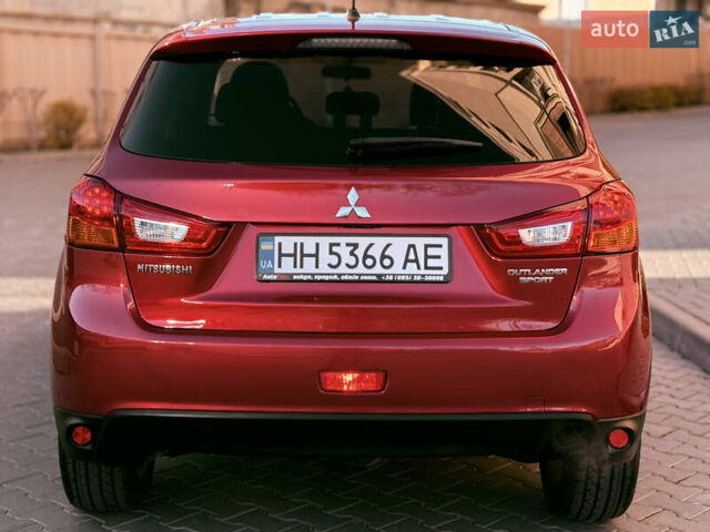 Красный Мицубиси Outlander Sport, объемом двигателя 2 л и пробегом 99 тыс. км за 11999 $, фото 5 на Automoto.ua