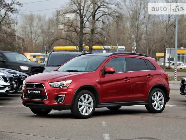 Красный Мицубиси Outlander Sport, объемом двигателя 2 л и пробегом 195 тыс. км за 12800 $, фото 2 на Automoto.ua