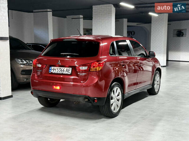 Красный Мицубиси Outlander Sport, объемом двигателя 2 л и пробегом 99 тыс. км за 11999 $, фото 22 на Automoto.ua