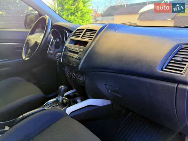 Красный Мицубиси Outlander Sport, объемом двигателя 2 л и пробегом 99 тыс. км за 11999 $, фото 25 на Automoto.ua