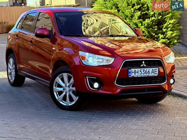 Красный Мицубиси Outlander Sport, объемом двигателя 2 л и пробегом 99 тыс. км за 11999 $, фото 4 на Automoto.ua