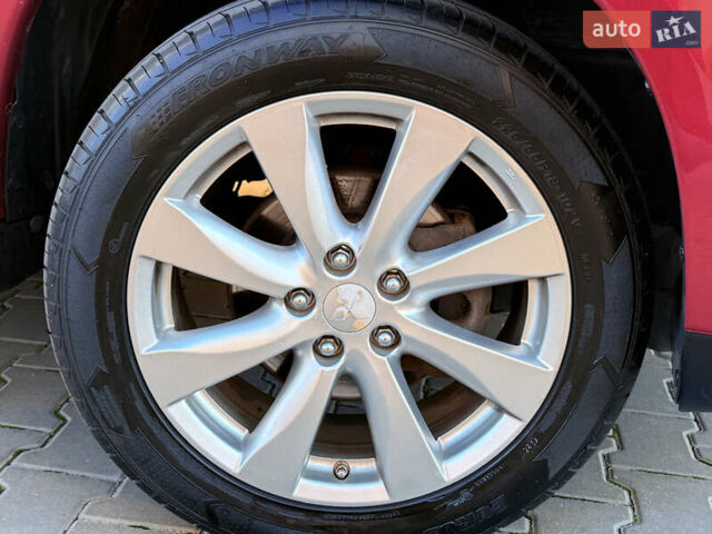Красный Мицубиси Outlander Sport, объемом двигателя 2 л и пробегом 99 тыс. км за 11999 $, фото 10 на Automoto.ua