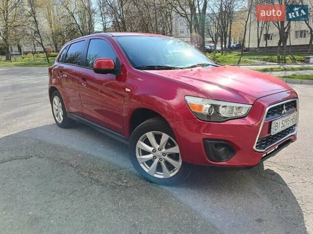 Красный Мицубиси Outlander Sport, объемом двигателя 2 л и пробегом 220 тыс. км за 11500 $, фото 7 на Automoto.ua