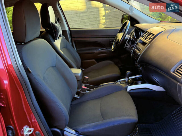 Красный Мицубиси Outlander Sport, объемом двигателя 2 л и пробегом 99 тыс. км за 11999 $, фото 24 на Automoto.ua