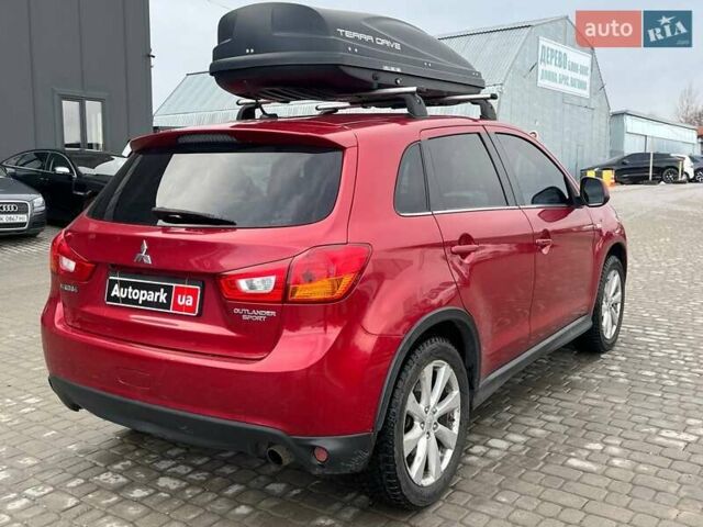 Красный Мицубиси Outlander Sport, объемом двигателя 2 л и пробегом 220 тыс. км за 10500 $, фото 1 на Automoto.ua