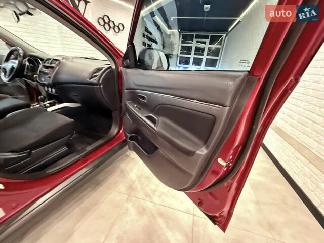 Красный Мицубиси Outlander Sport, объемом двигателя 2 л и пробегом 99 тыс. км за 11999 $, фото 38 на Automoto.ua