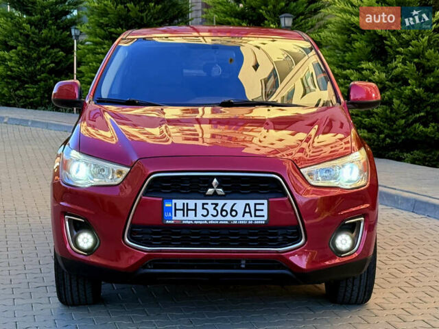 Красный Мицубиси Outlander Sport, объемом двигателя 2 л и пробегом 99 тыс. км за 11999 $, фото 6 на Automoto.ua