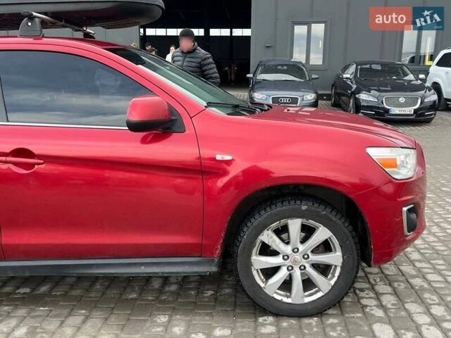 Красный Мицубиси Outlander Sport, объемом двигателя 2 л и пробегом 220 тыс. км за 10500 $, фото 16 на Automoto.ua