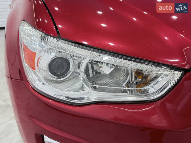 Красный Мицубиси Outlander Sport, объемом двигателя 2 л и пробегом 99 тыс. км за 11999 $, фото 6 на Automoto.ua