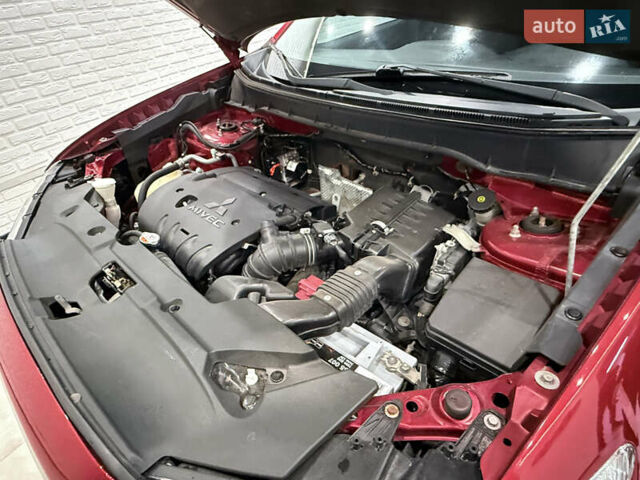 Красный Мицубиси Outlander Sport, объемом двигателя 2 л и пробегом 99 тыс. км за 11999 $, фото 24 на Automoto.ua