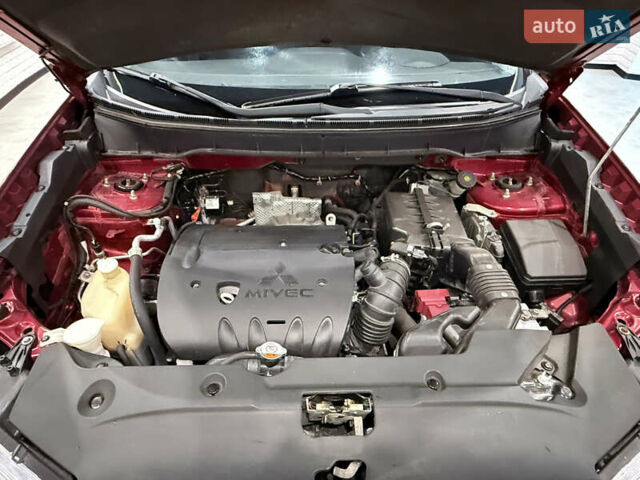 Красный Мицубиси Outlander Sport, объемом двигателя 2 л и пробегом 99 тыс. км за 11999 $, фото 22 на Automoto.ua