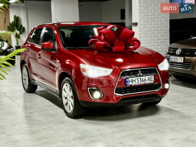 Красный Мицубиси Outlander Sport, объемом двигателя 2 л и пробегом 99 тыс. км за 11999 $, фото 13 на Automoto.ua