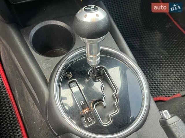 Красный Мицубиси Outlander Sport, объемом двигателя 2 л и пробегом 220 тыс. км за 10500 $, фото 8 на Automoto.ua