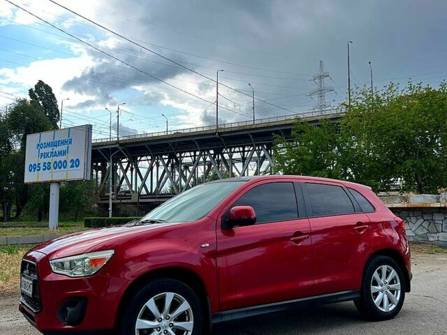 Красный Мицубиси Outlander Sport, объемом двигателя 2 л и пробегом 174 тыс. км за 10700 $, фото 3 на Automoto.ua
