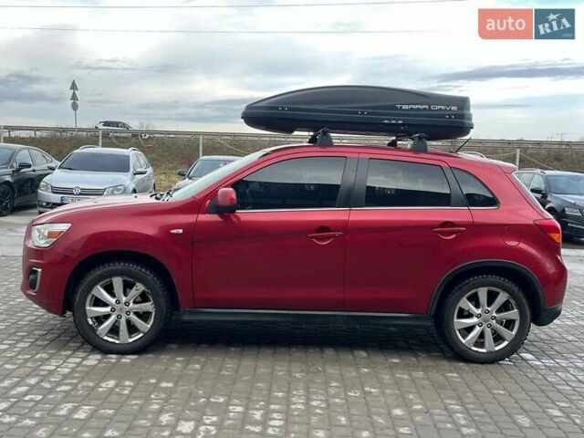 Красный Мицубиси Outlander Sport, объемом двигателя 2 л и пробегом 220 тыс. км за 10500 $, фото 15 на Automoto.ua
