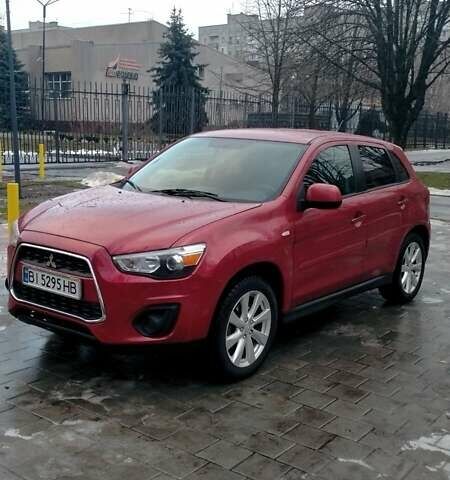 Красный Мицубиси Outlander Sport, объемом двигателя 2 л и пробегом 220 тыс. км за 11500 $, фото 1 на Automoto.ua