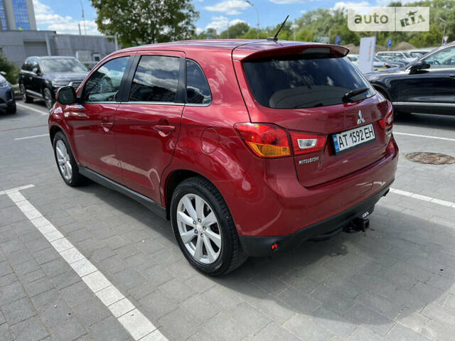 Красный Мицубиси Outlander Sport, объемом двигателя 2 л и пробегом 228 тыс. км за 11300 $, фото 7 на Automoto.ua