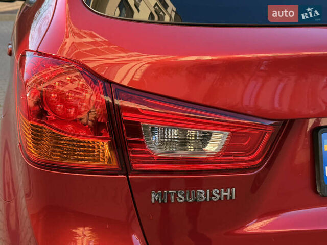 Красный Мицубиси Outlander Sport, объемом двигателя 2 л и пробегом 99 тыс. км за 11999 $, фото 27 на Automoto.ua