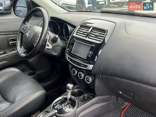 Красный Мицубиси Outlander Sport, объемом двигателя 2 л и пробегом 220 тыс. км за 10500 $, фото 4 на Automoto.ua