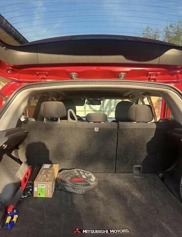 Красный Мицубиси Outlander Sport, объемом двигателя 2 л и пробегом 172 тыс. км за 12500 $, фото 7 на Automoto.ua