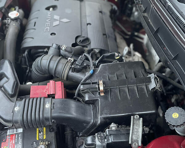 Красный Мицубиси Outlander Sport, об'ємом двигуна 2 л та пробігом 244 тис. км за 10950 $, фото 30 на Automoto.ua