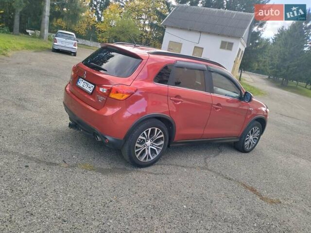 Красный Мицубиси Outlander Sport, объемом двигателя 2.4 л и пробегом 185 тыс. км за 12299 $, фото 11 на Automoto.ua