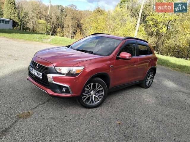 Красный Мицубиси Outlander Sport, объемом двигателя 2.4 л и пробегом 185 тыс. км за 12299 $, фото 2 на Automoto.ua