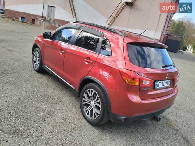 Красный Мицубиси Outlander Sport, объемом двигателя 2.4 л и пробегом 185 тыс. км за 12299 $, фото 9 на Automoto.ua