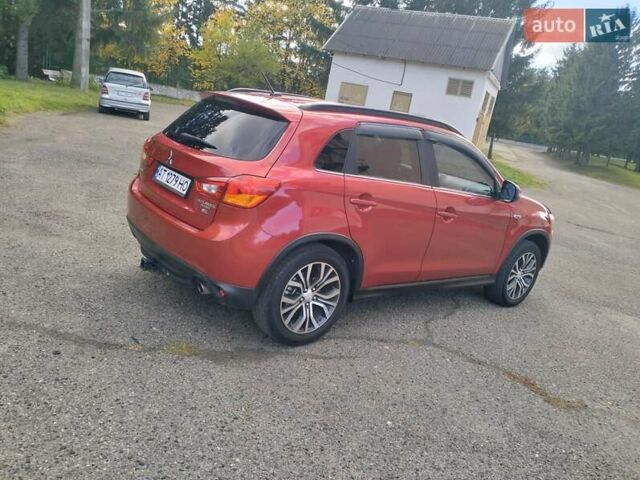 Красный Мицубиси Outlander Sport, объемом двигателя 2.4 л и пробегом 185 тыс. км за 12299 $, фото 12 на Automoto.ua