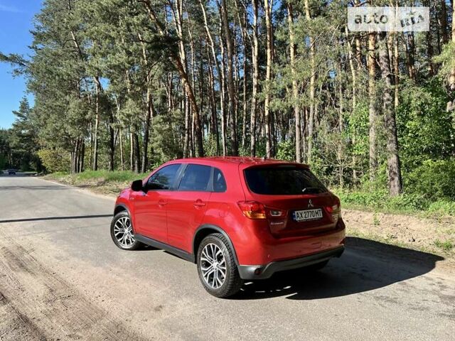 Красный Мицубиси Outlander Sport, объемом двигателя 2.4 л и пробегом 156 тыс. км за 11999 $, фото 3 на Automoto.ua