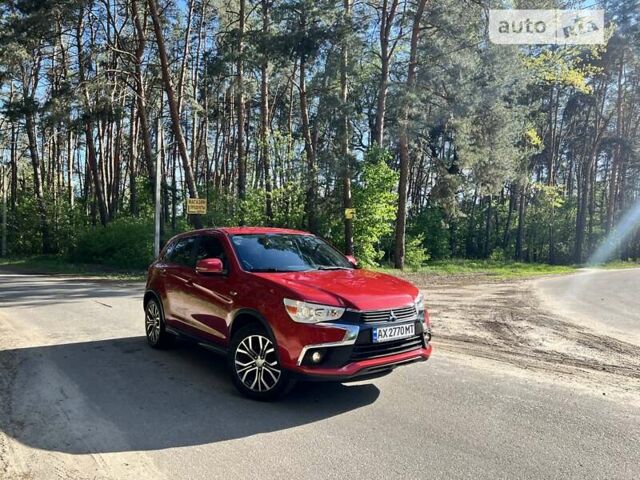 Красный Мицубиси Outlander Sport, объемом двигателя 2.4 л и пробегом 156 тыс. км за 11999 $, фото 1 на Automoto.ua