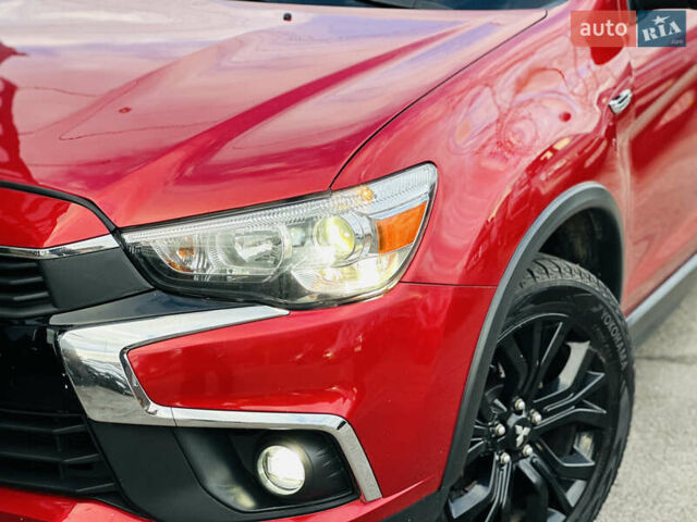 Красный Мицубиси Outlander Sport, объемом двигателя 2 л и пробегом 127 тыс. км за 12499 $, фото 2 на Automoto.ua