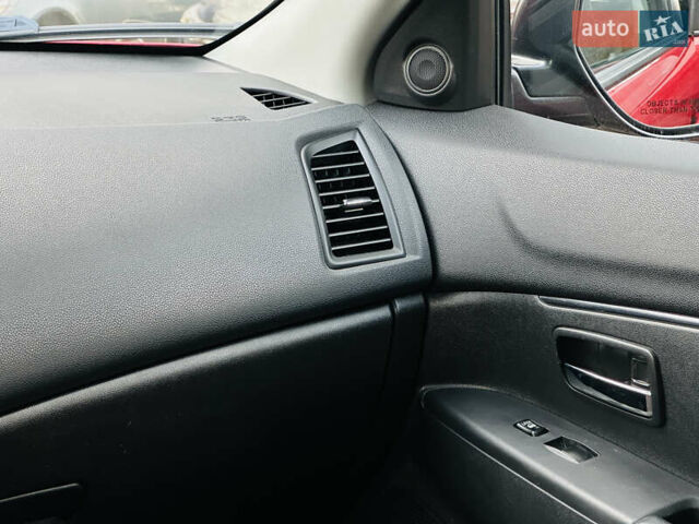 Красный Мицубиси Outlander Sport, объемом двигателя 2 л и пробегом 127 тыс. км за 12499 $, фото 31 на Automoto.ua