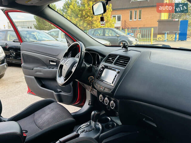 Красный Мицубиси Outlander Sport, объемом двигателя 2 л и пробегом 127 тыс. км за 12499 $, фото 35 на Automoto.ua