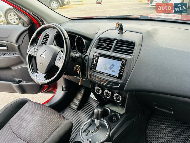 Красный Мицубиси Outlander Sport, объемом двигателя 2 л и пробегом 127 тыс. км за 12499 $, фото 37 на Automoto.ua