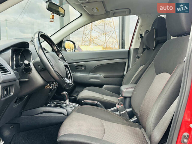Красный Мицубиси Outlander Sport, объемом двигателя 2 л и пробегом 127 тыс. км за 12499 $, фото 18 на Automoto.ua