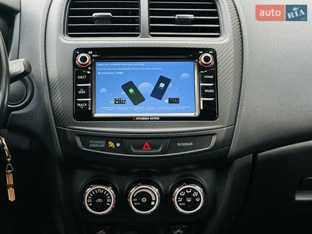 Красный Мицубиси Outlander Sport, объемом двигателя 2 л и пробегом 127 тыс. км за 12499 $, фото 30 на Automoto.ua