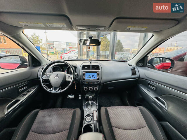 Красный Мицубиси Outlander Sport, объемом двигателя 2 л и пробегом 127 тыс. км за 12499 $, фото 26 на Automoto.ua