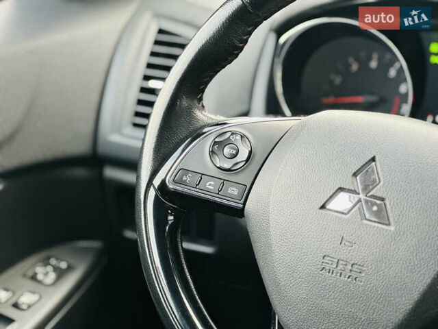 Красный Мицубиси Outlander Sport, объемом двигателя 2 л и пробегом 127 тыс. км за 12499 $, фото 29 на Automoto.ua