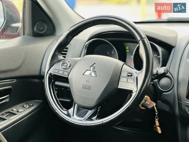Красный Мицубиси Outlander Sport, объемом двигателя 2 л и пробегом 127 тыс. км за 12499 $, фото 27 на Automoto.ua