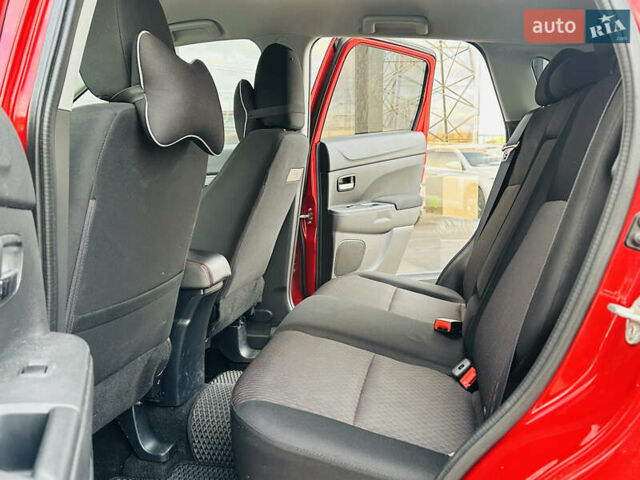 Красный Мицубиси Outlander Sport, объемом двигателя 2 л и пробегом 127 тыс. км за 12499 $, фото 22 на Automoto.ua