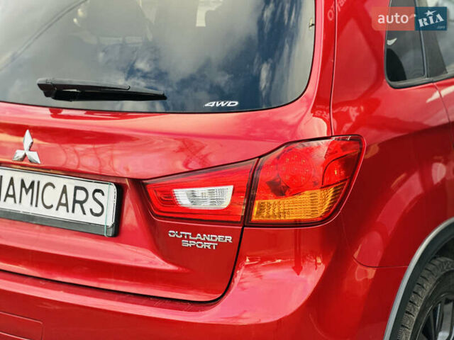 Красный Мицубиси Outlander Sport, объемом двигателя 2 л и пробегом 127 тыс. км за 12499 $, фото 5 на Automoto.ua