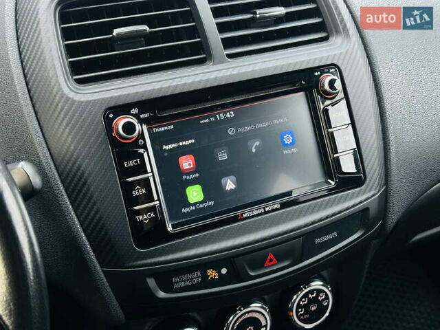 Красный Мицубиси Outlander Sport, объемом двигателя 2 л и пробегом 127 тыс. км за 12499 $, фото 15 на Automoto.ua