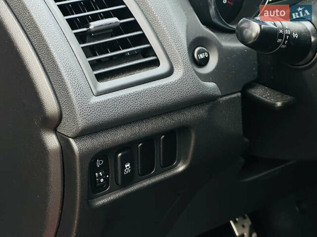 Красный Мицубиси Outlander Sport, объемом двигателя 2 л и пробегом 127 тыс. км за 12499 $, фото 14 на Automoto.ua